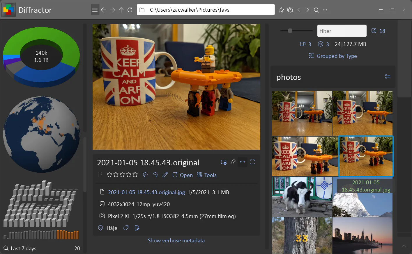 Diffractor browsing a photo library, with a globe of where the photos were taken